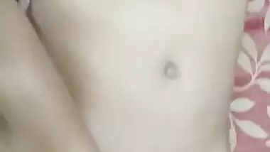 Cute girl play with her boobs and pussy