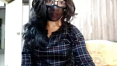 Desi cam girl opens checkered shirt to expose perky tits to XXX fans