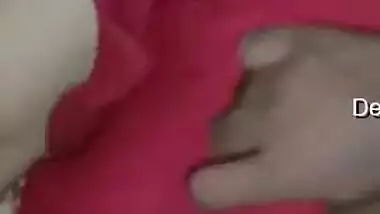 Wife lies on the bed letting the Desi hubby film the porn video