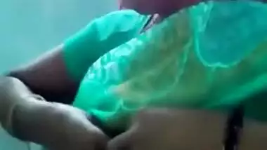 Horny Indian female un green helps man relax touching her XXX boobs