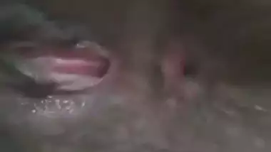 Indian nude girl shows her hairy wet pussy