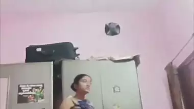 Sister changing dress caught on camera by brother