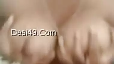 Desi female takes bra off discovering her XXX round jugs for online fan