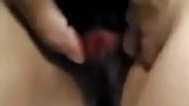 Natural Desi female spreads her sex legs while man touches the XXX zones