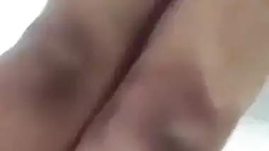 Beautiful desi girl lifting top to reveal sexy boobs