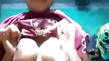 Desi teeny exposes big XXX boobs and plays with them in a sexy way