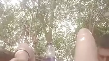 Mistress lets her servant lick her pussy during outdoor sex