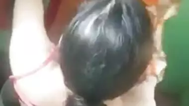 Female wears a yellow Indian sari after flashing her charms in voyeur porn video